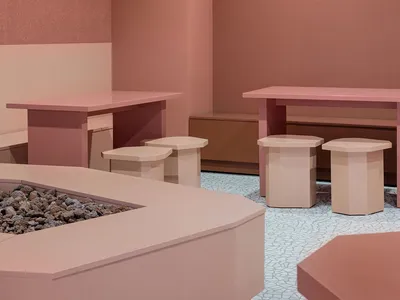 Modern restaurant interior designed with terrazzo surfaces.