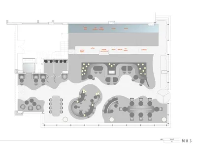 Floor plan of a coffee shop with seating areas, service counters, and storage areas.