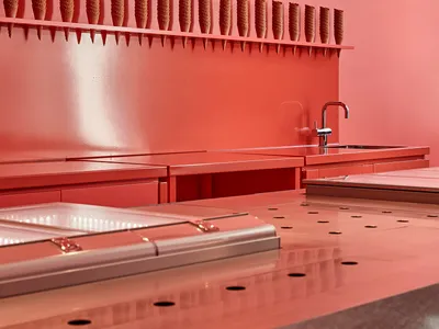 Coral pink-colored retail space with ice cream cones on display