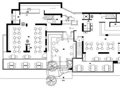 2D architectural plan of a modern restaurant interior.