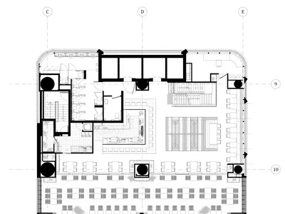 餐廳混凝土地板與空間配置的詳細建築平面圖。