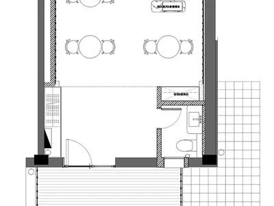 餐廳室內的詳細建築藍圖，展示空間配置、功能分區與家具擺設。