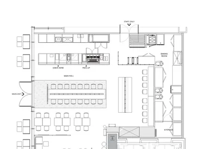 餐廳室內的詳細建築平面圖，包含點餐區、廚房區域、用餐區與儲藏空間