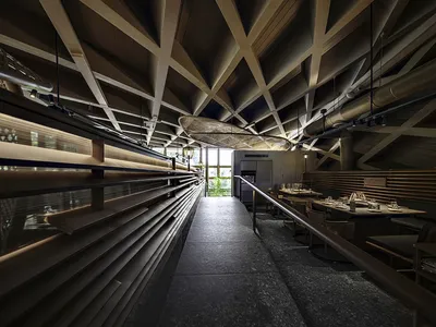 Industrial-style restaurant interior featuring a combination of wood materials.