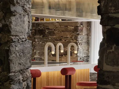 Modern bar interior with stools and counter