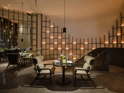 Modern restaurant interior with wooden and glass materials
