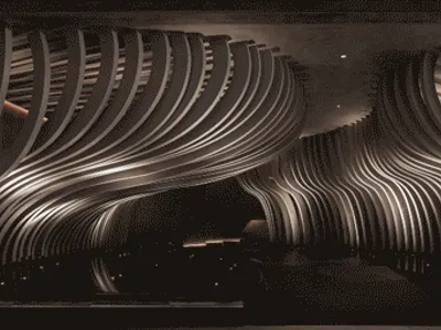 An interior design featuring metallic waves as a central element.