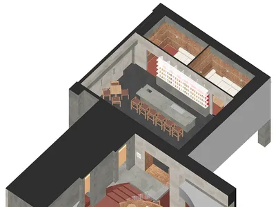 現代工業風餐廳室內，搭配混凝土地板與家具，中央設有圓形座位區與吧台