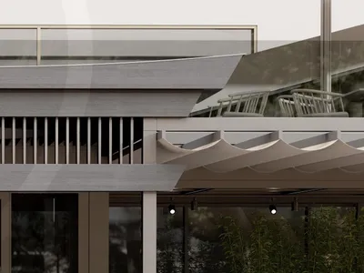 A modern restaurant exterior featuring natural stone and concrete materials.