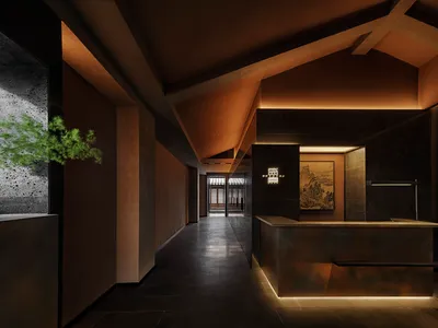 Industrial-style hotel reception desk made of metal and concrete