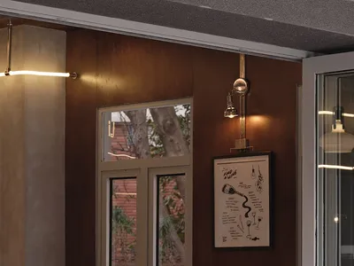 Industrial-style restaurant interior with wood, metal, and glass materials.