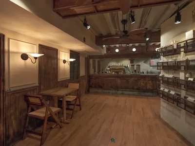Industrial-styled restaurant interior with wooden accents, featuring a bar counter, chairs, and light fixtures.