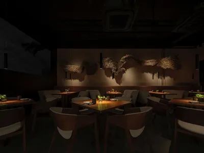 一間設計精良的工業風餐廳室內空間，搭配現代家具與簡約裝飾。