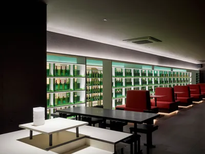 A modern restaurant with a glass counter.