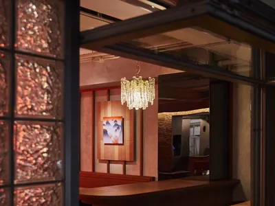 Modern restaurant with glass block walls and wooden counter