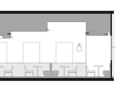 Floor plan of a cafe interior with wooden elements, tables, and chairs.