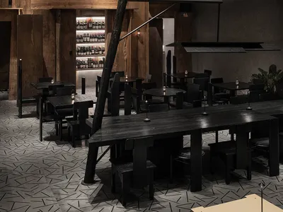 A modern industrial restaurant interior with wooden materials and dark tones.