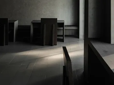 Interior view of a modern restaurant featuring a concrete floor wavy water display