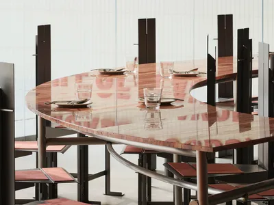 Modern restaurant dining room with wooden tables, concrete walls, and the words 'Smoked Goods, Full of Flavor' on the wall.