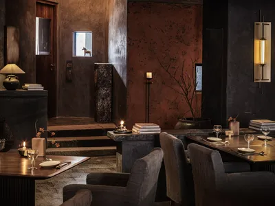 Industrial design restaurant with metal, stone, and wood accents.