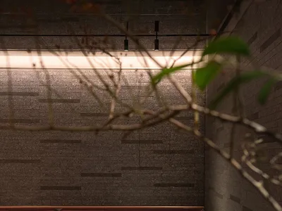 Industrial-themed restaurant with brick walls and metal furniture and fixtures.