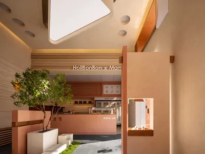 Cafe interior with terrazzo flooring, wooden accents, and a large window