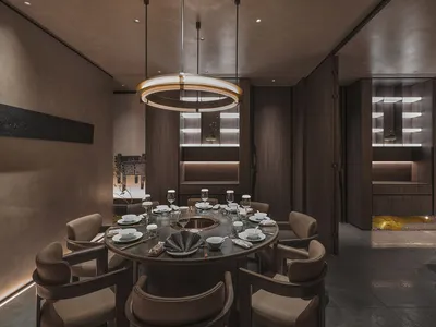 Industrial-themed restaurant interior with wooden furniture and concrete accents.