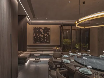 Modern restaurant interior with wooden materials and contemporary design features.
