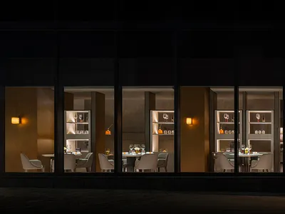 Modern restaurant interior design with contemporary furniture and lighting.