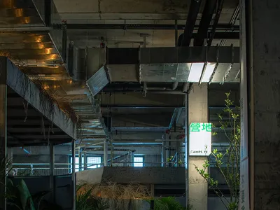 Concrete floor and ceiling in a modern industrial restaurant space