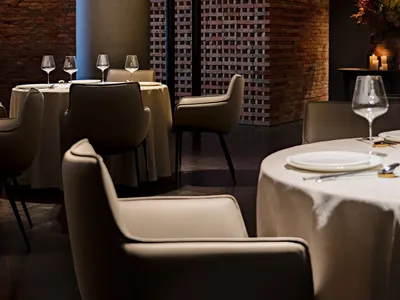 Modern restaurant interior with brick and concrete textures