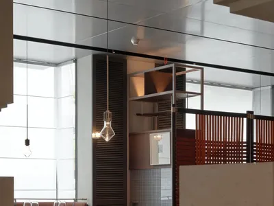A modern dining room interior with contemporary furniture and minimalist decor.