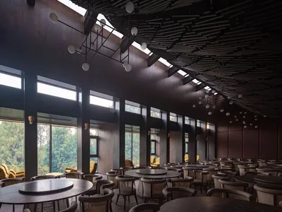 Industrial-themed restaurant interior featuring wood materials and high ceilings with skylights.