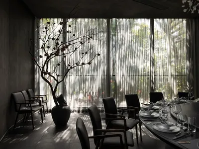 Modern dining room with glass curtains and minimalist design