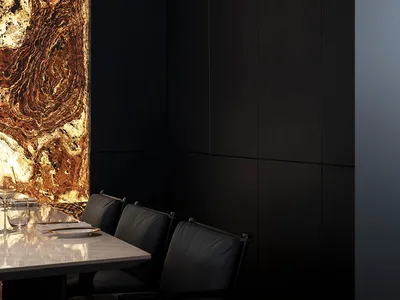 Modern restaurant interior featuring a striking marble wall