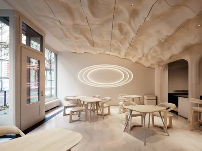 Marbled wood tables and chairs in a modern restaurant interior