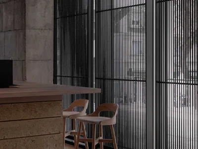 現代工業風酒吧餐廳室內，採用混凝土、木材與玻璃元素。