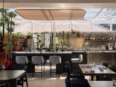 Modern restaurant interior with steel and wood accents