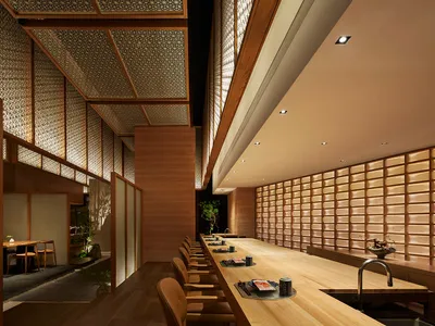 簡約風格的餐廳室內，設有木質吧台與座位區。