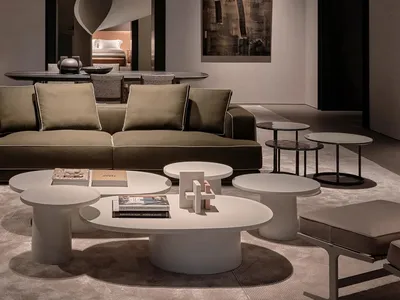 Industrial design living room featuring modern metal, glass, and wood elements.