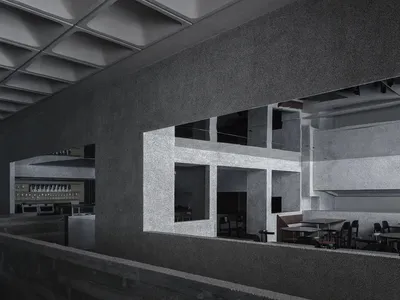 A minimalist restaurant interior with a concrete ceiling and metal walls.