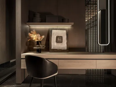A modern home office featuring a floating desk with a minimalist design, illuminated by ambient lighting and complemented wit