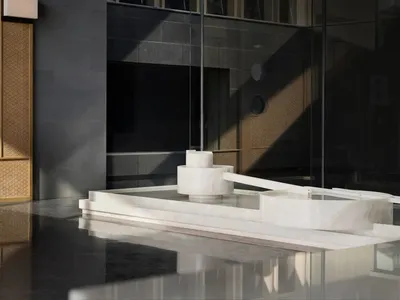 Modern lobby with marble features in a hotel setting.