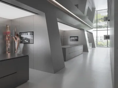 A modern metallic kitchen with sleek, minimalist design.