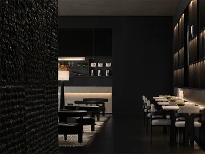 A modern restaurant interior with minimalist design and black concrete walls.