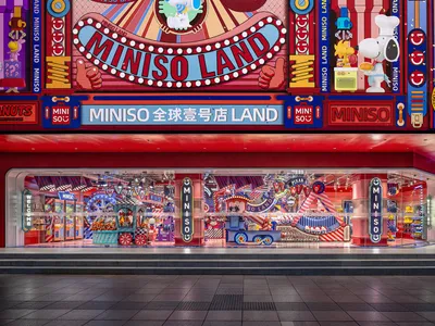 A vibrant and colorful storefront with glass display cases showcasing a variety of products.