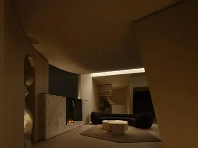 An industrial-style living room with concrete walls, marble tiles, and a fireplace.