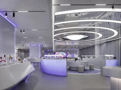 A modern restaurant interior featuring minimalist design with concrete and glass materials.