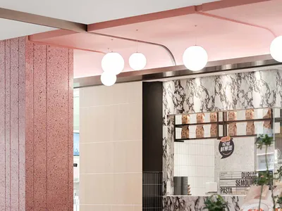 Modern cafe interior featuring terrazzo, marble, and concrete materials