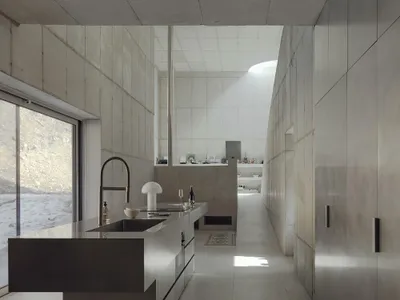 A contemporary kitchen with minimalist design and concrete finishes